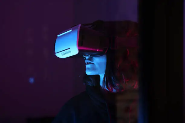 Photo of Woman wearing VR Glasses s