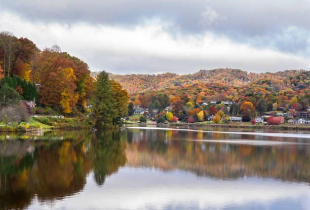 Lake Junaluska autumn  mountain view. Autumn lake in colorful forest. Blue Ridge Mountains. Near Asheville, North Carolina, USA.