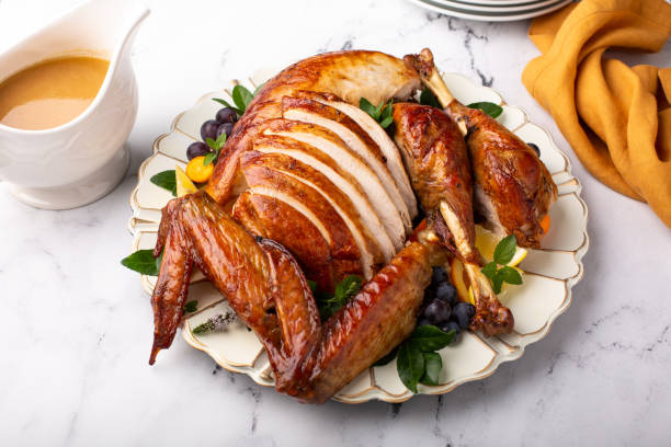 istock Carved roasted turkey for a celebration dinner 1351167300