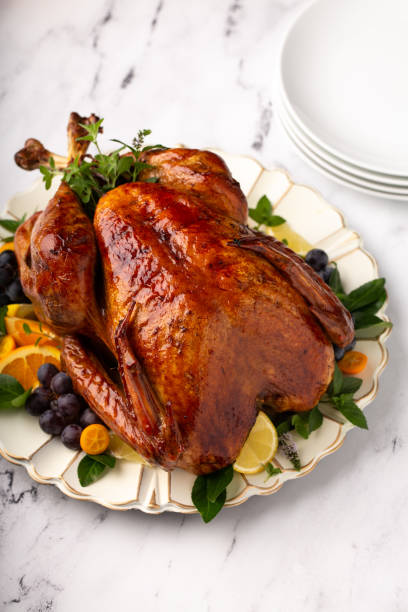 istock Festive roasted turkey for a celebration dinner 1351167307
