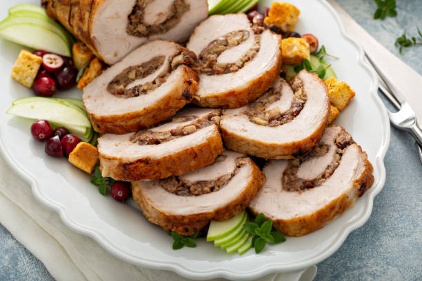 istock Stuffed roasted pork loin stuffed with apple stuffing 1351168746