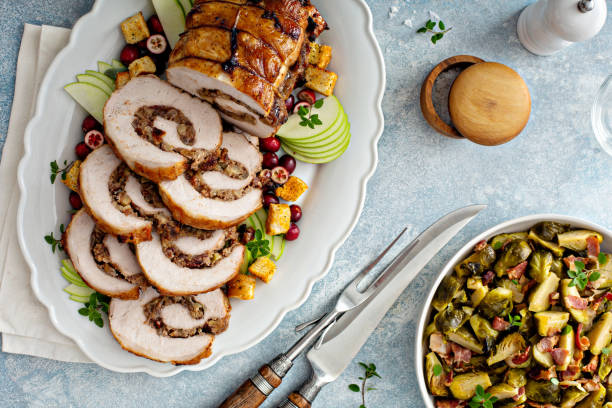istock Stuffed roasted pork loin stuffed with apple stuffing 1351168760