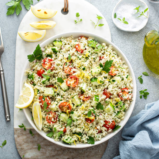 istock Tabbouleh salad with cauliflower rice and vegetables 1351168784