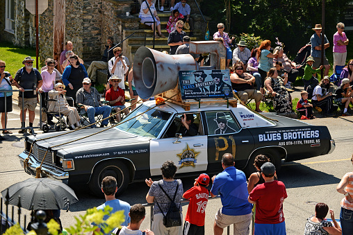 Dartmouth, Canada - August 5, 2013: The iconic Blues Brothers car is part of the annual Natal Day Parade in the Halifax Regional Municipality. They are advertising their upcoming appearance in the Dutch Mason Blues Festival in Nova Scotia