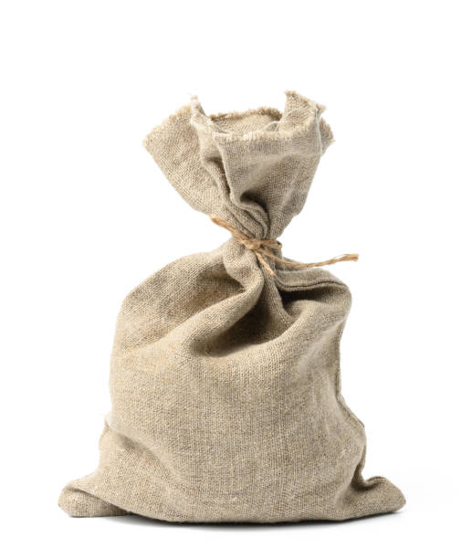 istock full canvas bag tied with rope and isolated on a white background 1351171198