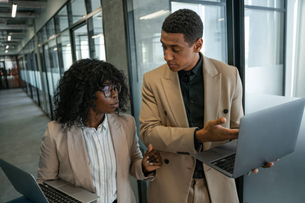 istock Young mixed race business people working in the office and having fun 1351177589