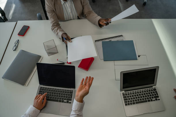 istock Young mixed race business people working in the office and having fun 1351177645