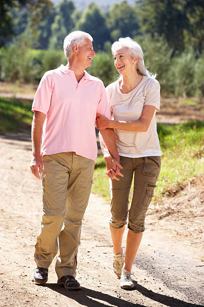 istock Senior couple on country walk 135118120