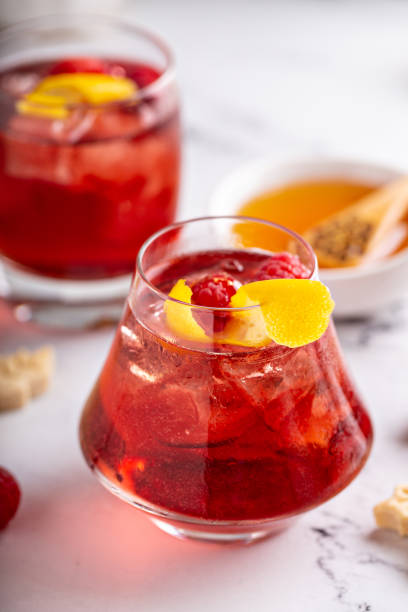 istock Raspberry, honey and lemon cocktail or mocktail 1351182283