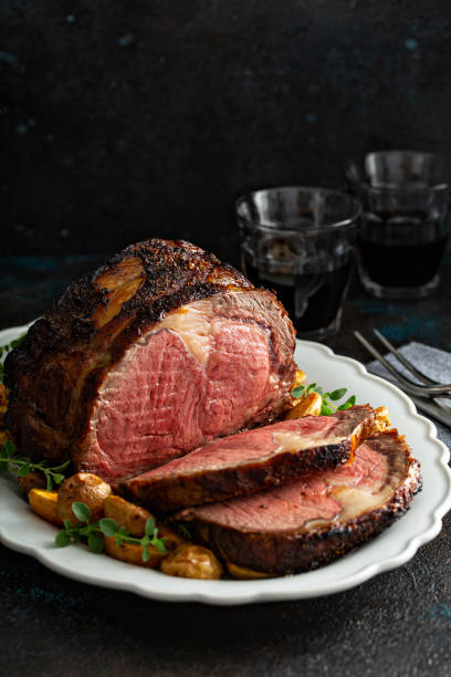 istock Prime rib roast sliced for celebration dinner 1351182292