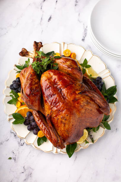 istock Whole roasted turkey for Thanksgiving dinner overhead 1351182308
