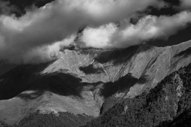 istock Dramatic cloudy sky on the Mysterious autumn mountain 1351189162