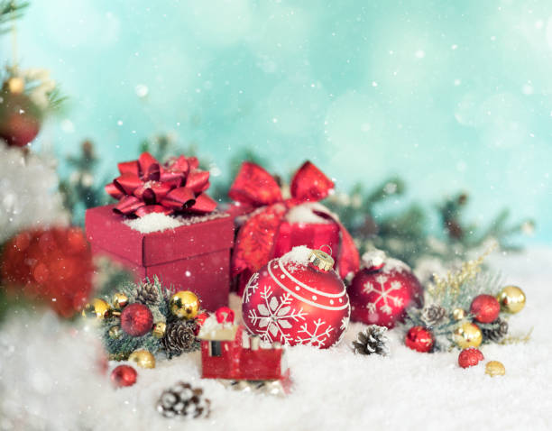 istock Christmas Gifts and Baubles on a Blue Background 1351193713