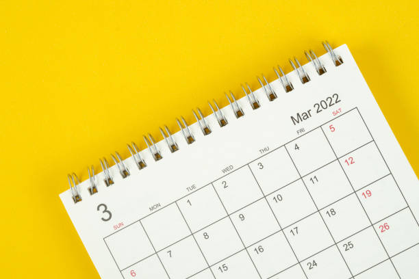 March month, Calendar desk 2022 for organizer to planning and reminder on yellow background. March month, Calendar desk 2022 for organizer to planning and reminder on yellow background. calendar date photos stock pictures, royalty-free photos & images