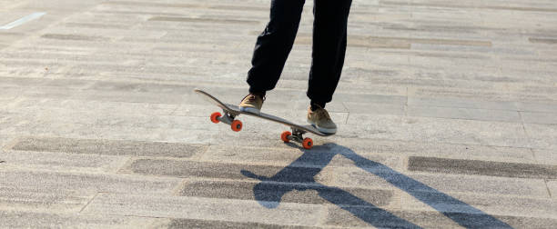 istock Skateboarder skateboarding outdoors in city 1351194907