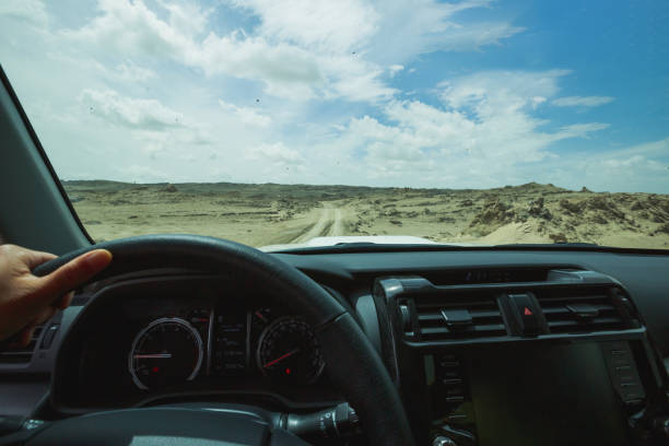 istock Driving off road car in the desert 1351195645