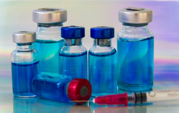 istock group of vaccine vials and syringe 1351207892