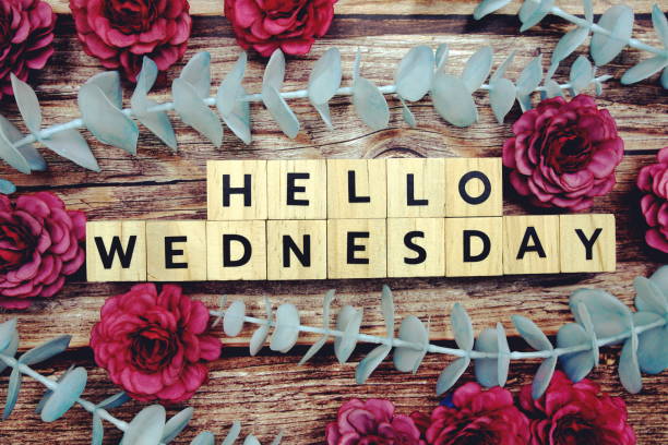 Hello Wednesday alphabet letter and flower decorate on wooden background Hello Wednesday alphabet letter and flower decorate on wooden background wednesday morning stock pictures, royalty-free photos & images