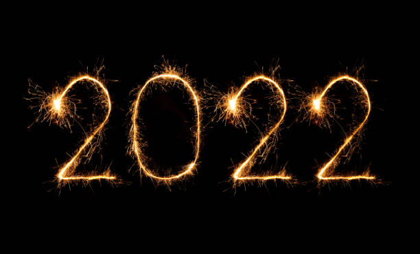 istock 2022 happy new year fireworks written sparkling at night 1351217834