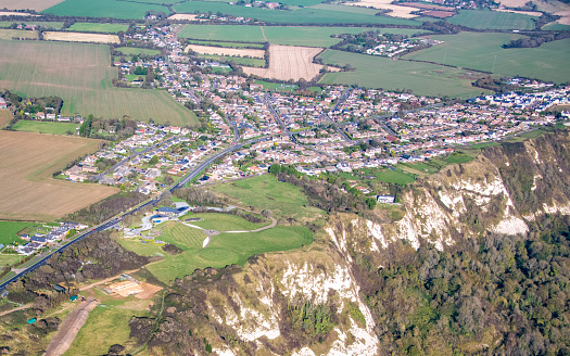 aerial view of the village of Capel le ferne in Kent, UK .  Also showing the Battle of britain memorial park