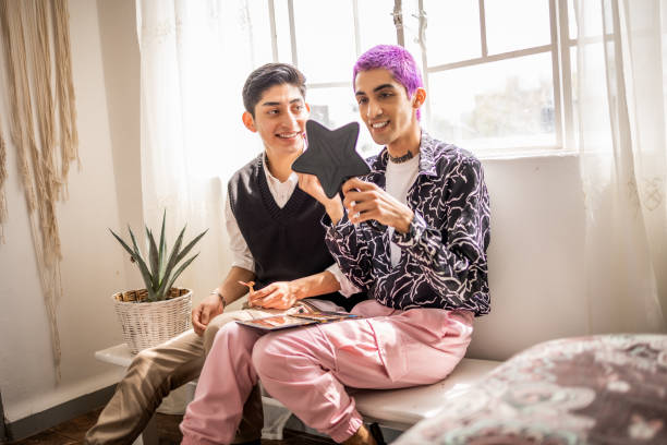 istock Two gay friends at home 1351218897
