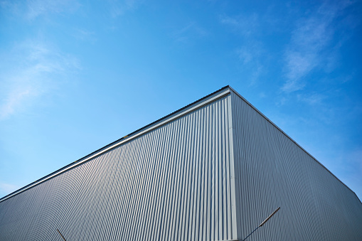 Metal sheet building with vivid blue sky