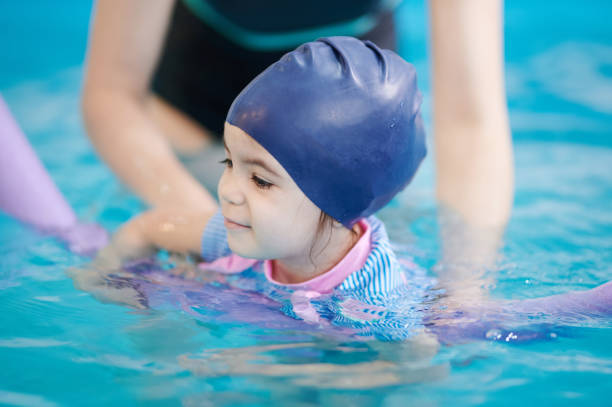 istock Teaching kids to swim 1351219463
