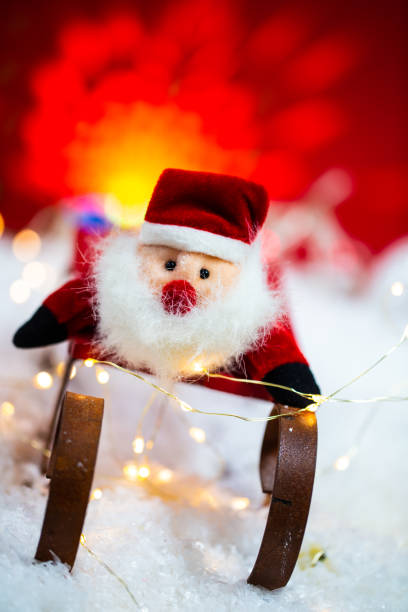 istock funny santa claus on sledge, merry christmas 1351223538
