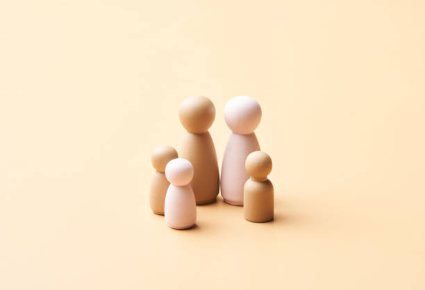 istock Diverse lesbian couple with kids 1351223731