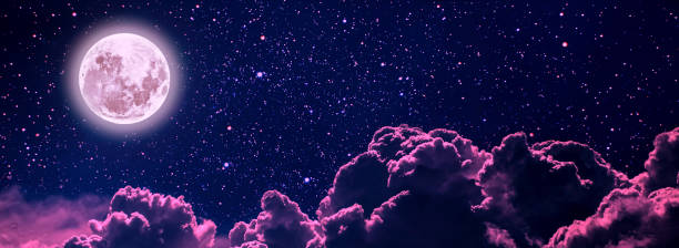 istock backgrounds night sky with stars and moon and clouds. 1351225239