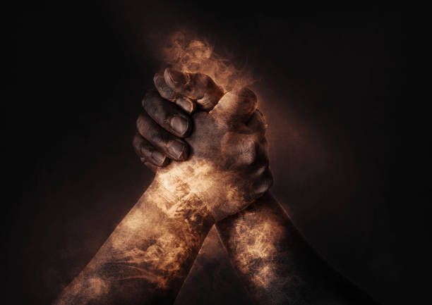istock Illustration of confrontation with arm wrestling 1351225311