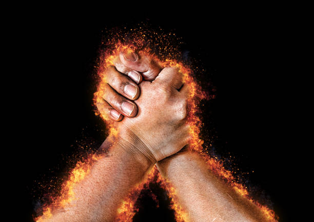 istock Illustration of confrontation with arm wrestling 1351225339