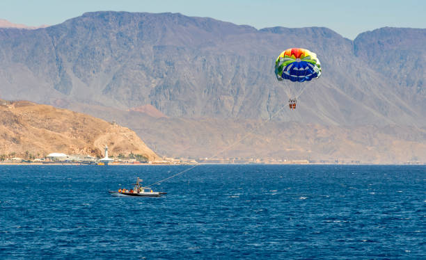 parasailing in open waters of the red sea, middle east - parasailing stok fotoğraflar ve resimler