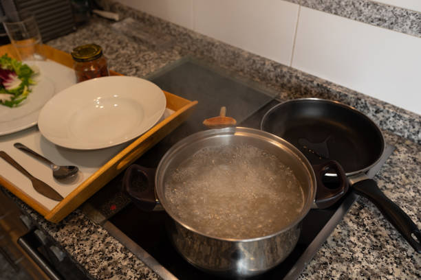 istock Cooking pasta and meat at the kitchen. 1351231562