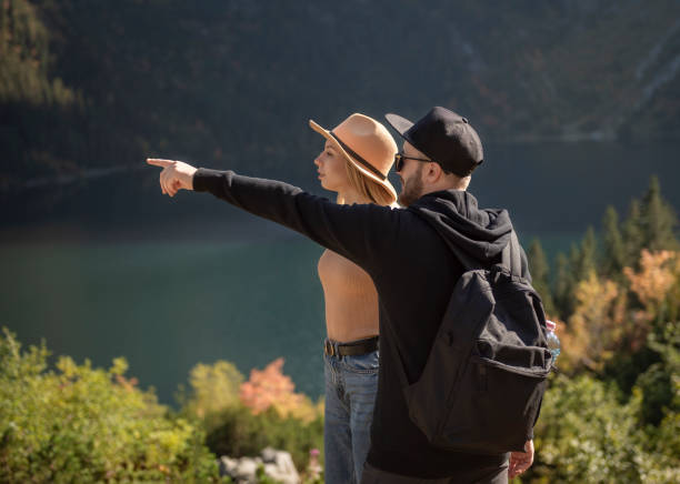 istock Young couple traveling in the mountains 1351233109