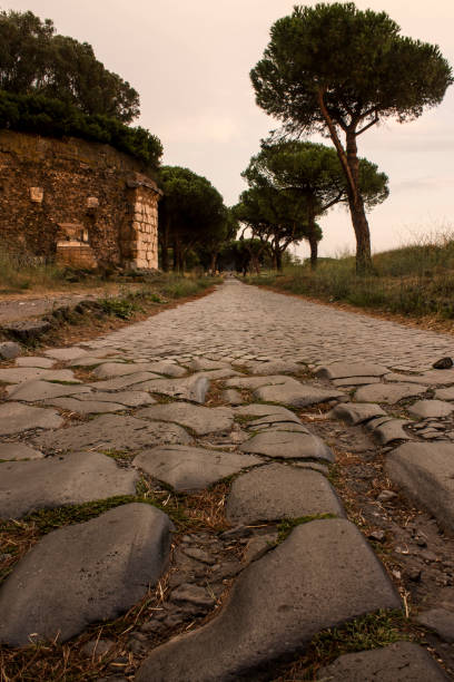 istock sunset on ancient roman road 1351235802