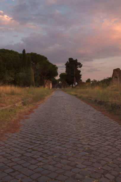 istock sunset on ancient roman road 1351235804