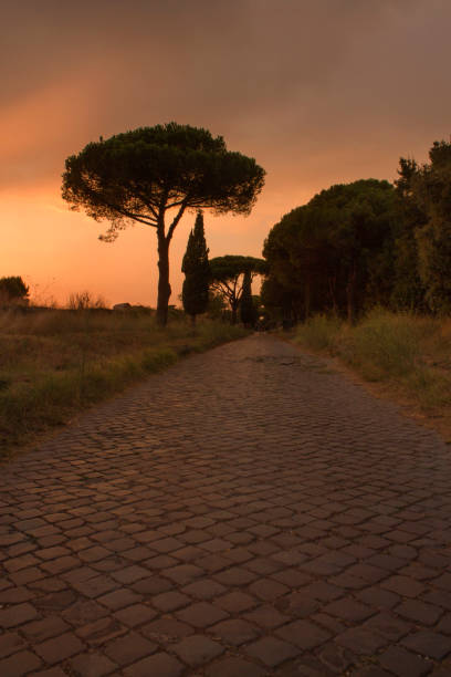 istock sunset on ancient roman road 1351235810