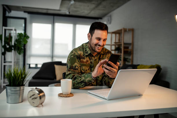 istock Army man with smart phone 1351243207