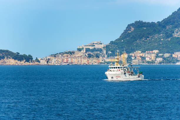 fishing boat in the channel of portovenere , la spezia italy