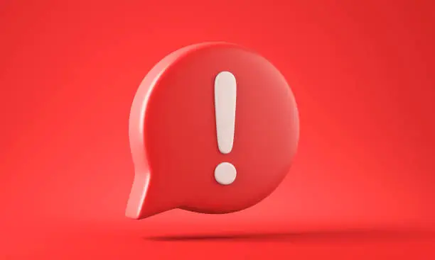 Photo of Social media notification white exclamation mark on red speech bubble