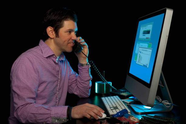 istock IT Service Technician Helping Customers Over The Phone 135124716