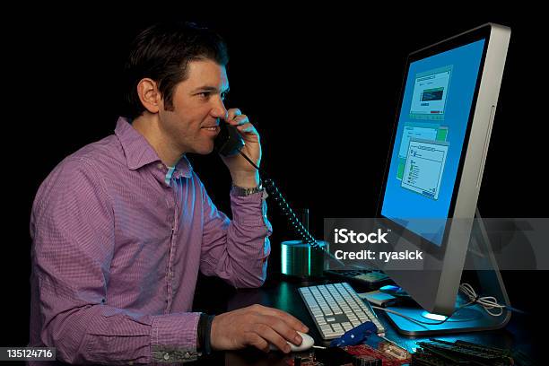 It Service Technician Helping Customers Over The Phone Stock Photo - Download Image Now