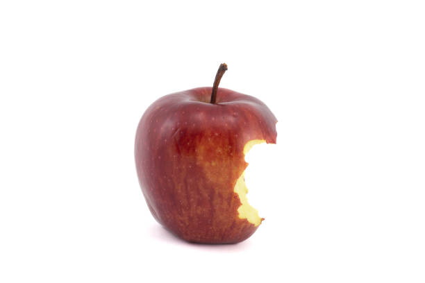 maçã vermelha com mordida - rotting apple fruit missing bite - fotografias e filmes do acervo