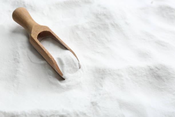 istock Wooden scoop on baking soda. Space for text 1351249446