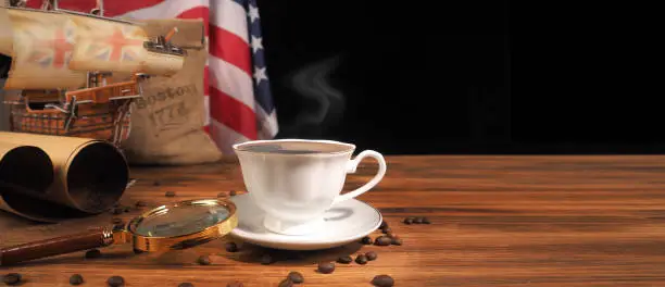 Photo of Boston tea party is symbol of English tea rejection . Distribution coffee in America. USA flag