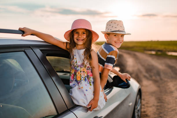 istock Beautiful children enjoying on a road trip 1351249754