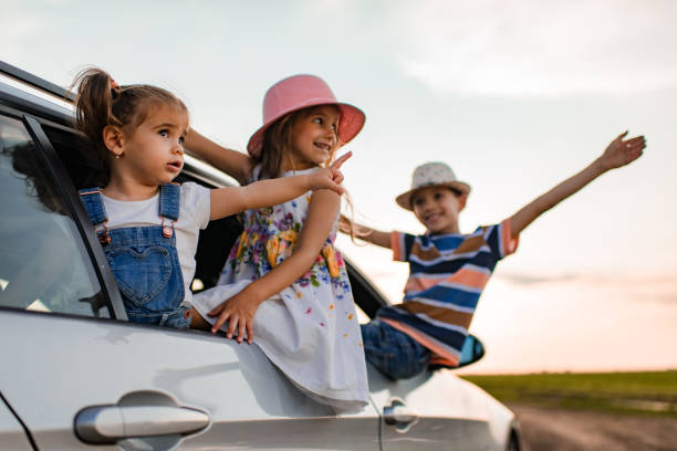 istock Beautiful children enjoying on a road trip 1351249885