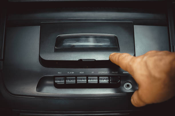 istock pressing buttons on a tape recorder, hand close-up 1351252979