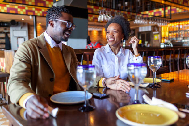 istock Two Friends Having A Great Time In Restaurant 1351257666